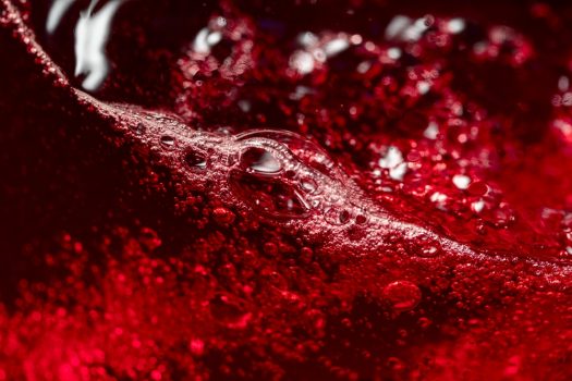 Red,Wine,Abstract,Splashing,In,Glass.,Macro,Shot.,Copy,Space.